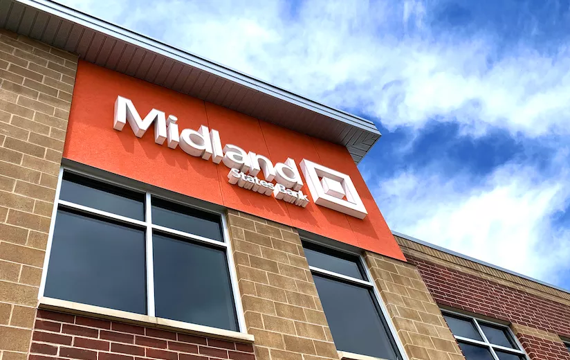 midland states bank sign on building against blue sky